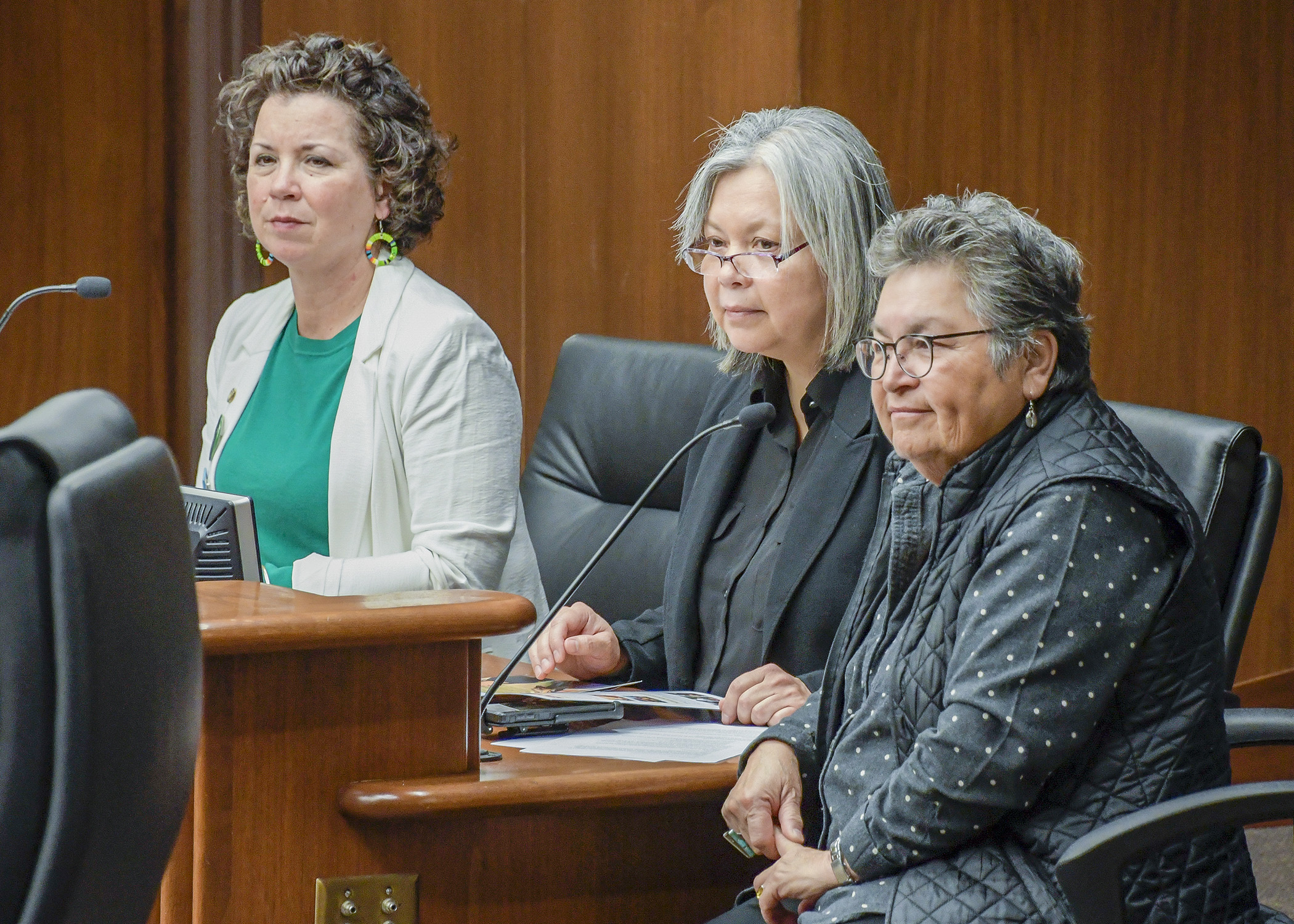 Sharon Day, executive director of the Indigenous Peoples Task Force, and former Rep. Susan Allen, center, testify before the House Jobs and Economic Development Finance Division March 5. Photo by Andrew VonBank